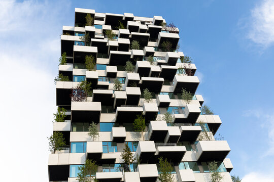 Eindhoven, The Netherlands, May 19th 2021. Vertical garden tower with trees creating greenery and nature for the social housing residents of the city, Strijp S