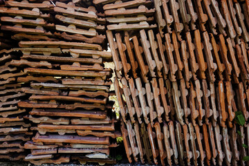 Wall pile of old ceramic tiles