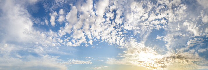 Panoramic sky clouds background. Beautiful sky with white clouds