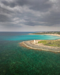 Fototapeta na wymiar Medieval tower on the sea, Puglia, Italy. Aerial landscape