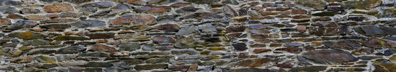 beautiful vintage texture of the wall of a medieval castle built in the middle of the 14th century,...