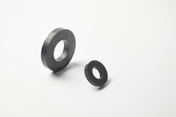 Magnetic field interaction between two ferrite magnets, equilibrium in the attraction of two forces