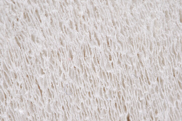 Macro photography of toilet paper, white textured background