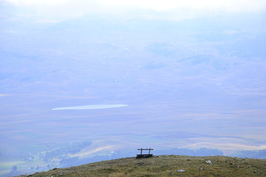 Bench in the mountains overlooking the lake. Montenegro.