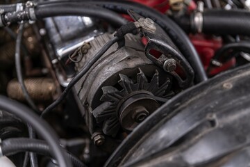 Electric car part alternator in old classic car