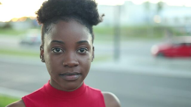 Young woman smiling at the camera
