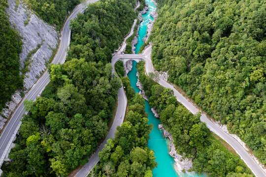 Aerial view about Soca valley with way and Napoleon bridge. This amazing canyon in Slovenia. This is the famous parto of country In Julian Alps Mountains.
