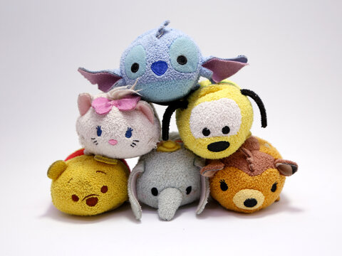Toys Tsum tsum. Stitch, kitty Mary, Pluto, Winnie the Pooh, Dumbo and Bambi. Walt Disney Studios characters. Stuffed toys for children. Stackable toys with famous cartoons.