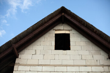 House made of concrete blocks. An unfinished country house.