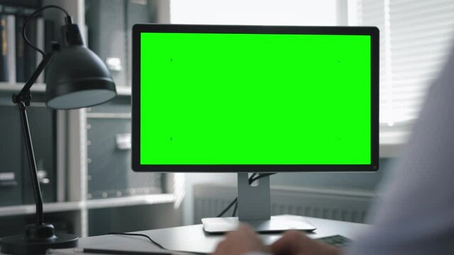 Green screen of office computer