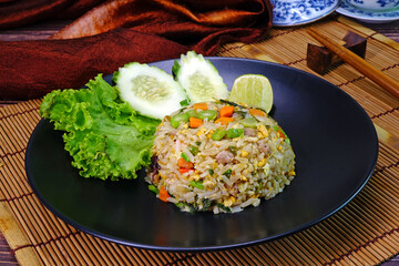 Yangzhou fried rice. Yangzhou fried rice is a popular Chinese-style wok fried rice dish in many Chinese restaurants throughout the world.