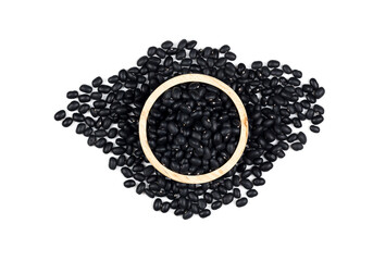 Healthy black beans in a wooden cup on a white background.