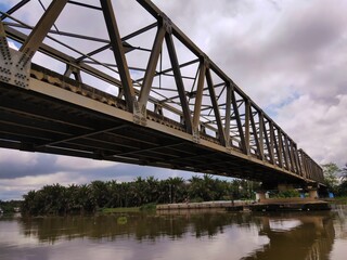 Fototapeta na wymiar Sungai Pinang Bridge at Banjarmasin, South Kalimantan, Indonesia