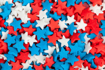 red, blue and white star-shaped candies