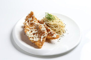 deep fried golden crispy fish fillet in tartar sauce with carbonara pasta noodle western seafood cuisine menu