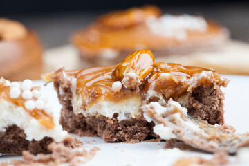 tartlet with milk cheese filling and lots of salted caramel with nuts