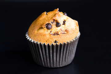 wheat cupcake with chocolate chunks, close up