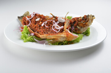 deep fried crispy whole grouper fish with spicy chilli onion sambal sauce asian Halal seafood menu