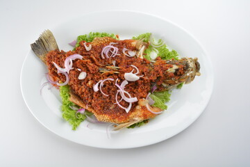 deep fried crispy whole grouper fish with spicy chilli onion sambal sauce asian Halal seafood menu