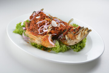 deep fried crispy whole grouper fish with spicy chilli onion sambal sauce asian Halal seafood menu