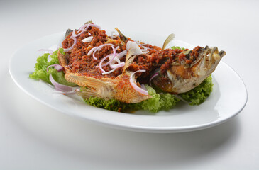 deep fried crispy whole grouper fish with spicy chilli onion sambal sauce asian Halal seafood menu