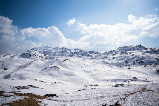 mountain top covered by a thick layer of snow