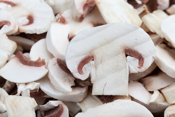 champignon mushrooms cut for heat treatment