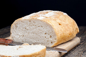 fresh loaf of wheat flour bread