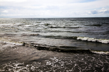 sea coast with lots of waves from windy weather