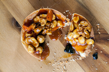 round-shaped tartlet with nuts and dried fruits