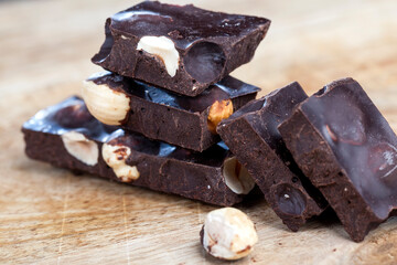 divided into pieces a piece of chocolate from cocoa