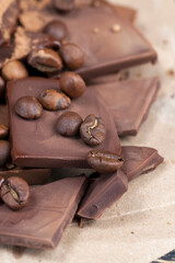 chocolate bar with cocoa powder topping and coffee beans