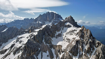 Snowy mountains view from above. Italian Dolomites