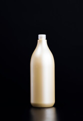 yellow plastic bottle with lid for liquids