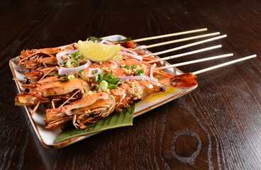 Thai style grilled bbq big tiger prawn with spicy chilli onion sauce and lime seafood halal menu