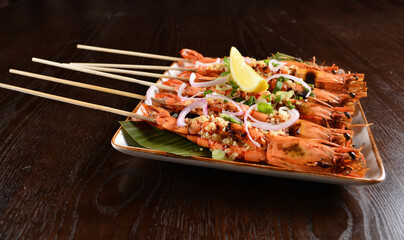 Thai style grilled bbq big tiger prawn with spicy chilli onion sauce and lime seafood halal menu
