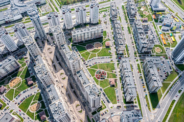 Fototapeta premium new high-rise apartment buildings in modern residential neighborhood. aerial view on summer day