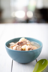 Boiled pork leg clear soup with peanut