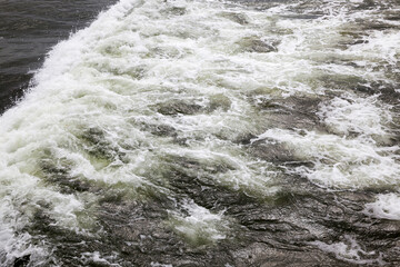 sea coast with lots of waves from windy weather