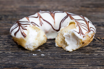 delicious doughnuts with chocolate covered filling, close up