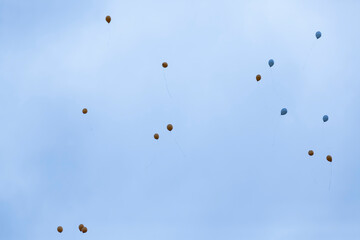 balloons with helium in sky