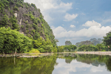 Trang An, Tam Coc, Ninh Binh, Viet nam. It's is UNESCO World Heritage Site, renowned for its boat cave tours. It's Halong Bay on land of Vietnam. Vietnam reopens borders after quarantine Coronovirus