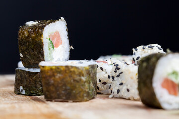sushi made from white rice, trout and avocado