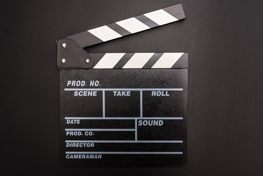 Clapper board on black background