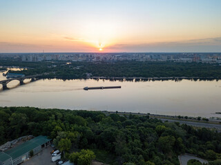 Dnieper river in Kiev at dawn. Clear morning. Aerial drone view.