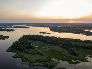Sunrise over the wide river Dnieper. Aerial drone view.