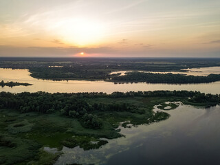 Sunrise over the wide river Dnieper. Aerial drone view.