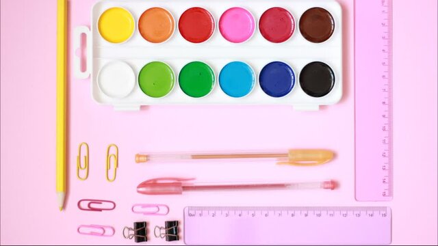 flatley school supplies on pink background, stationery, back to school, space for your text, top view