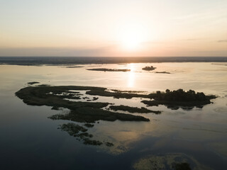 Fototapeta na wymiar Sunrise over the wide river Dnieper. Aerial drone view.