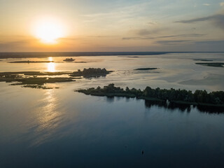 Sunrise over the wide river Dnieper. Aerial drone view.